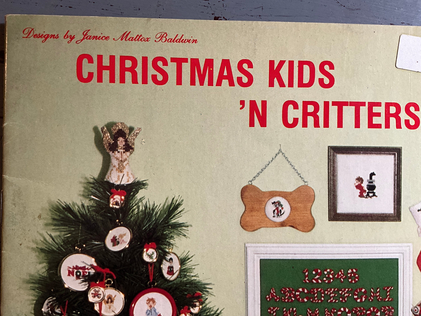 Designs by Janice Maltox Baldwin Christmas Kids N Critters counted cross stitch chart