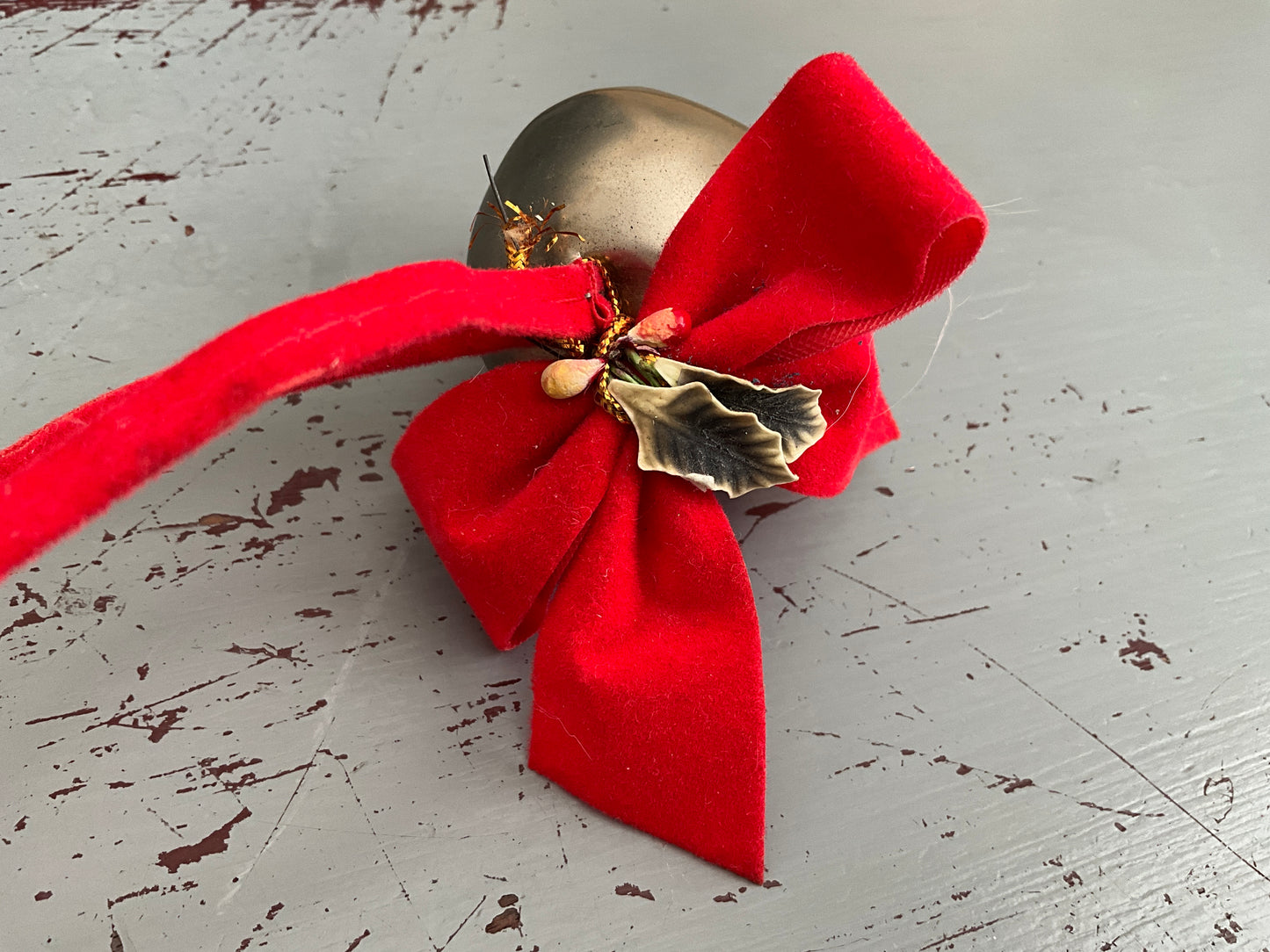 Cheerful chrome Christmas sleigh bell with red velvet bow & leaves vintage ornament