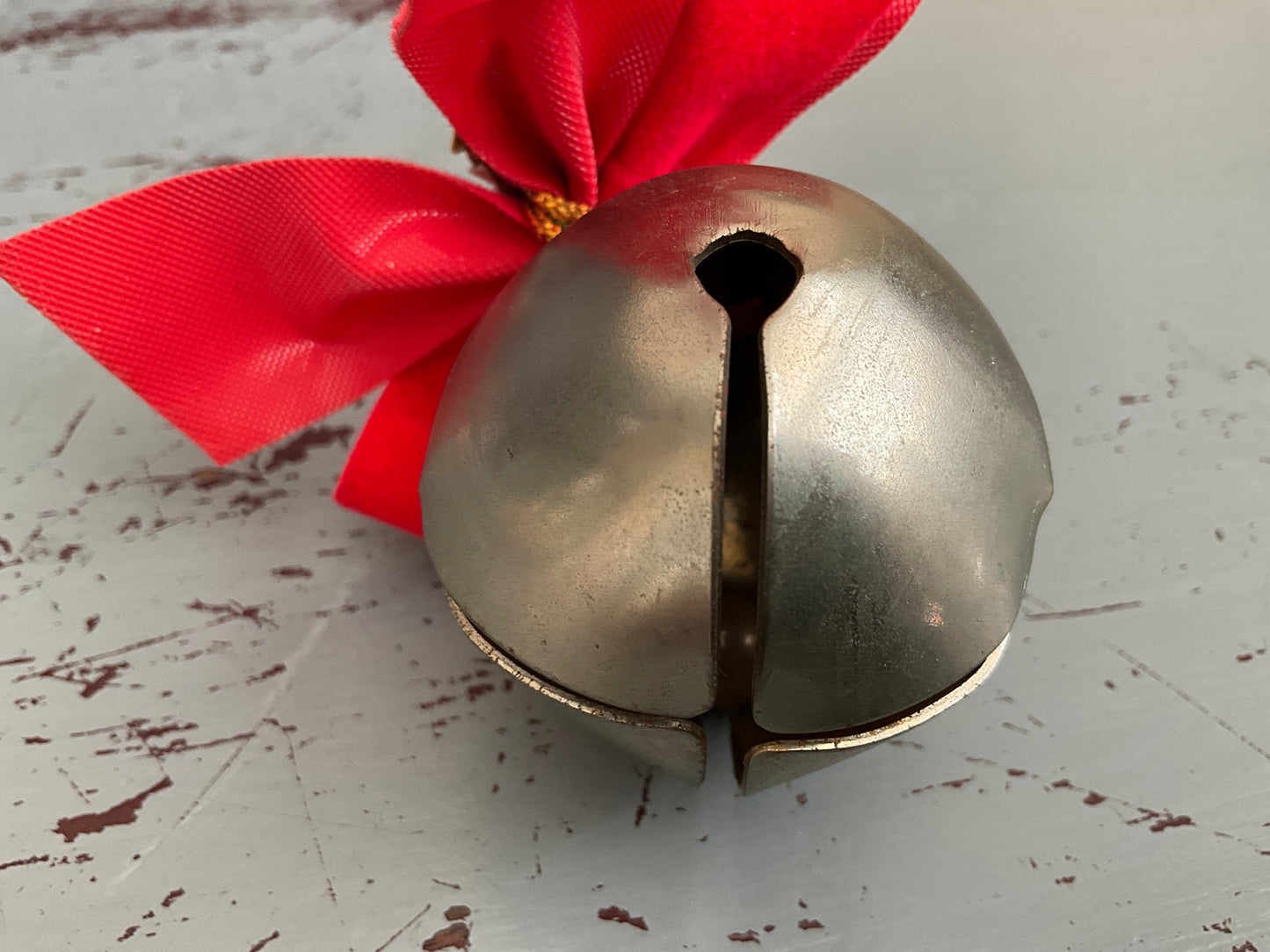 Cheerful chrome Christmas sleigh bell with red velvet bow & leaves vintage ornament