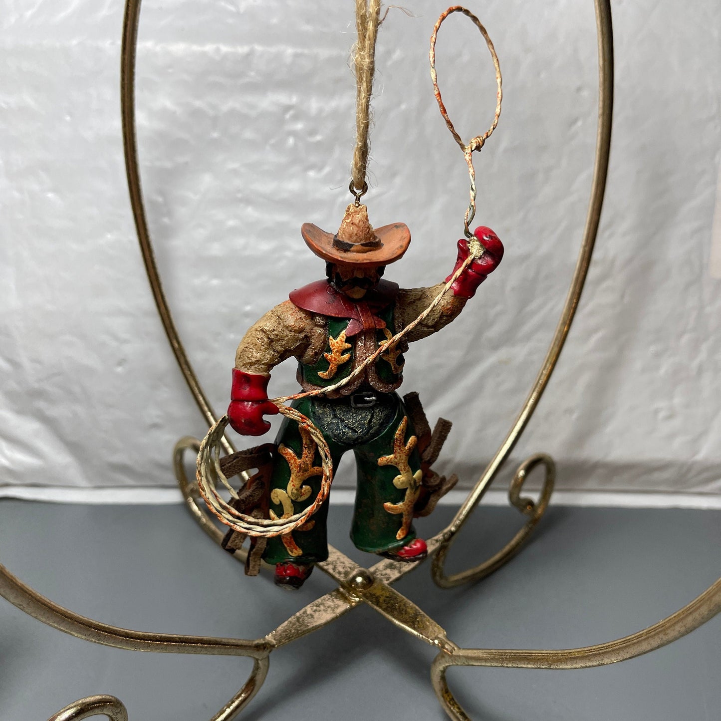 Lasso Cowboy and Saddle with Stirrups Set Of 2 Western Christmas Ornaments