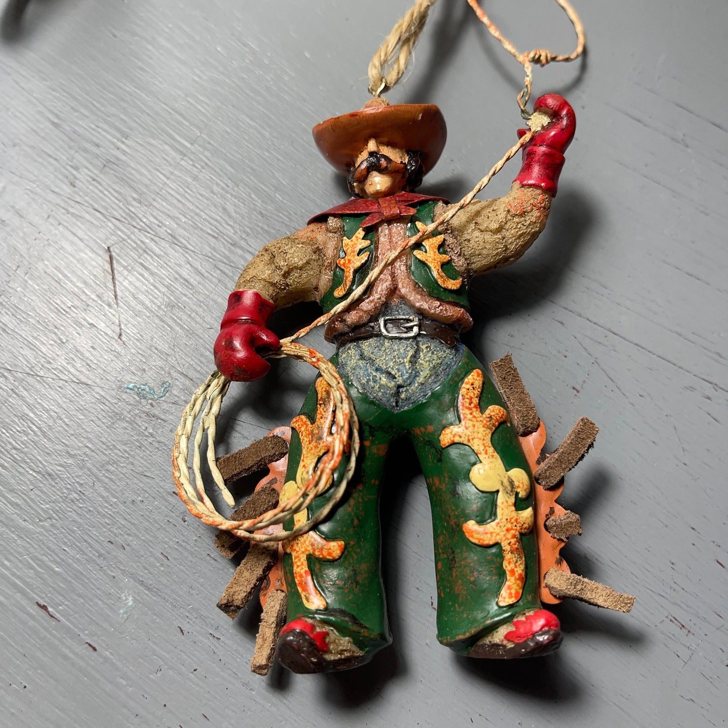 Lasso Cowboy and Saddle with Stirrups Set Of 2 Western Christmas Ornaments