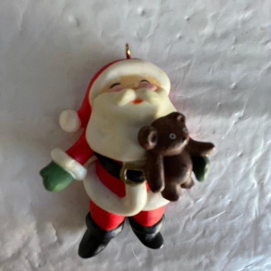 Russ Santa Clause Holding A Teddy Bear Ornament