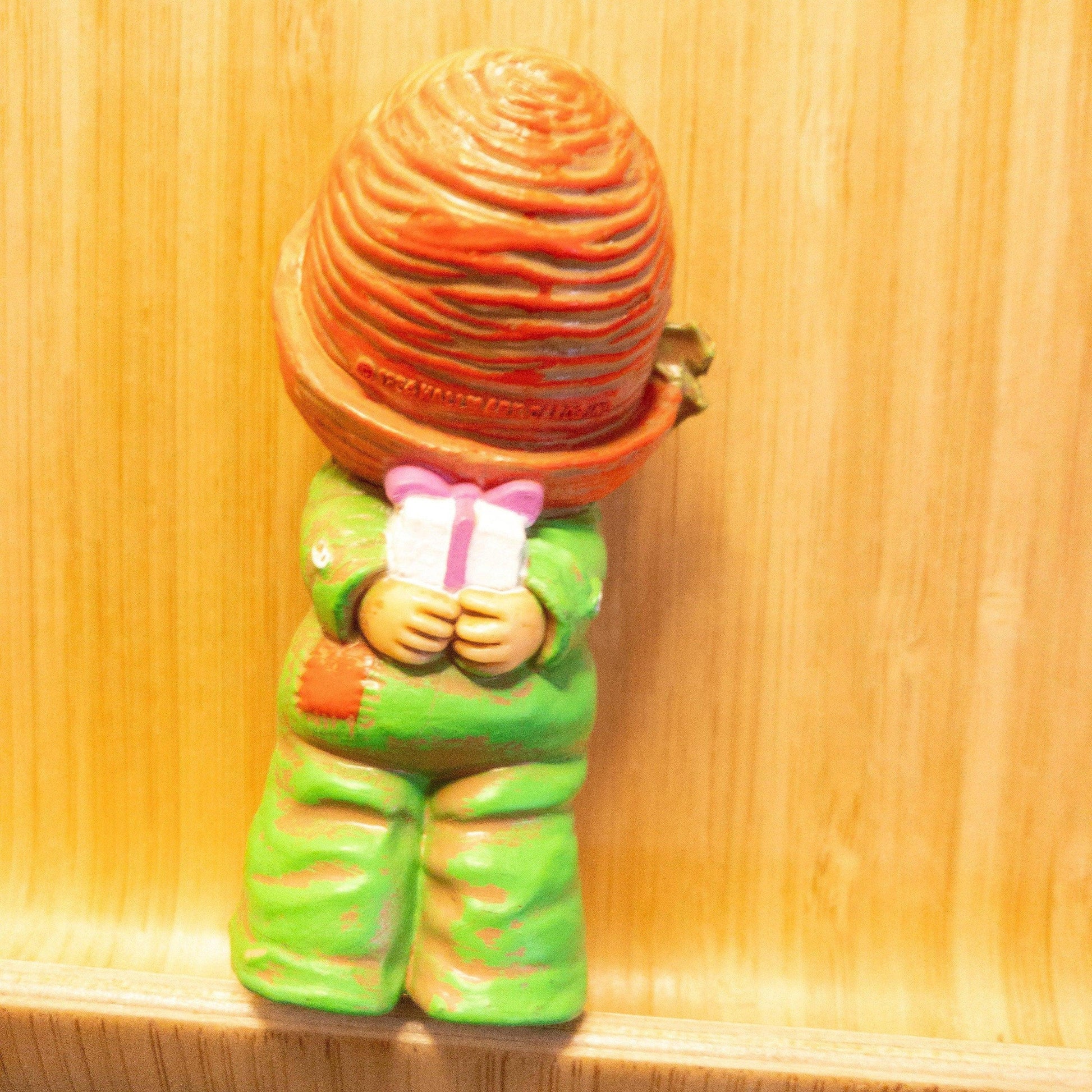 Little Boy in Knit Cap, Hiding Gift Behind His Back, Ornament