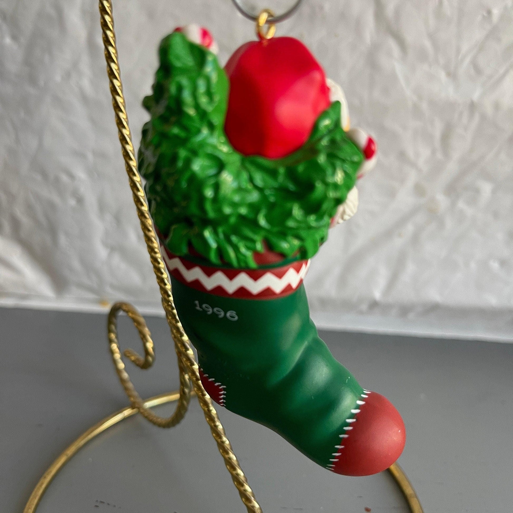 Hallmark Teddy Bear Santa Holding a String Of Metal Bells In A stocking Dated 1996 Christmas Ornament
