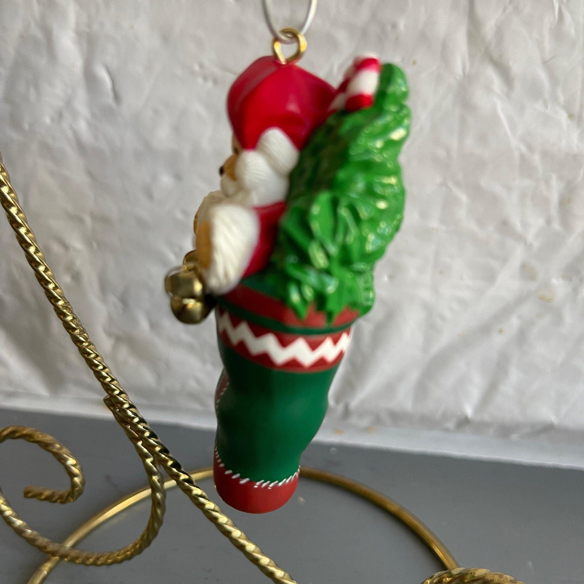 Hallmark Teddy Bear Santa Holding a String Of Metal Bells In A stocking Dated 1996 Christmas Ornament