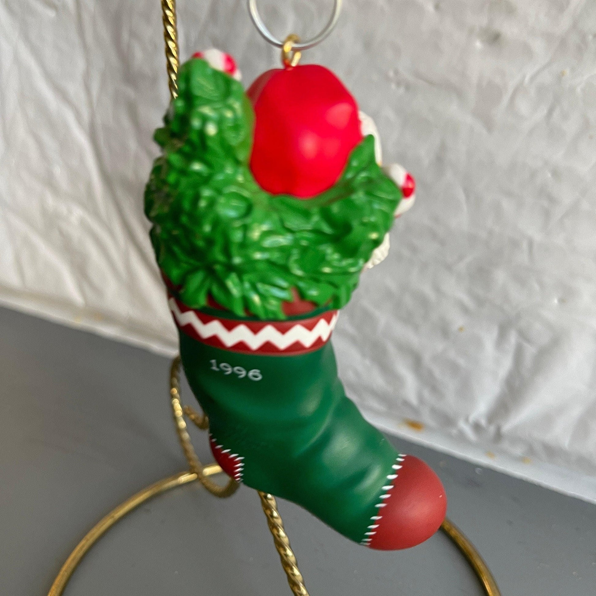 Hallmark Teddy Bear Santa Holding a String Of Metal Bells In A stocking Dated 1996 Christmas Ornament