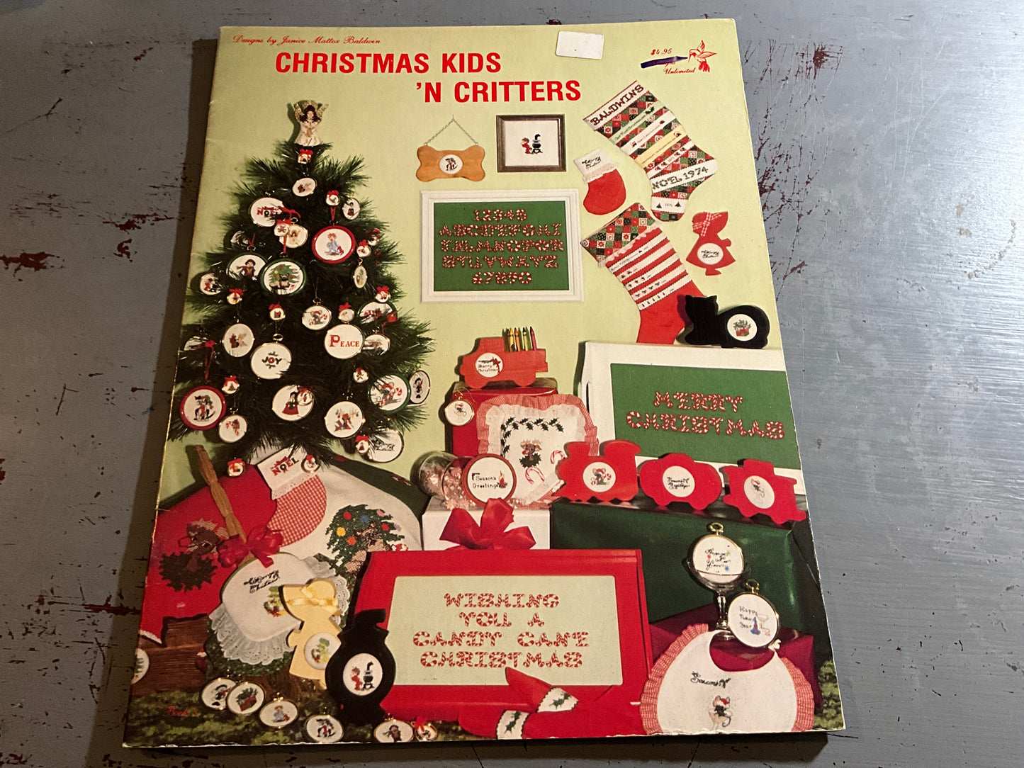 Designs by Janice Maltox Baldwin Christmas Kids N Critters counted cross stitch chart