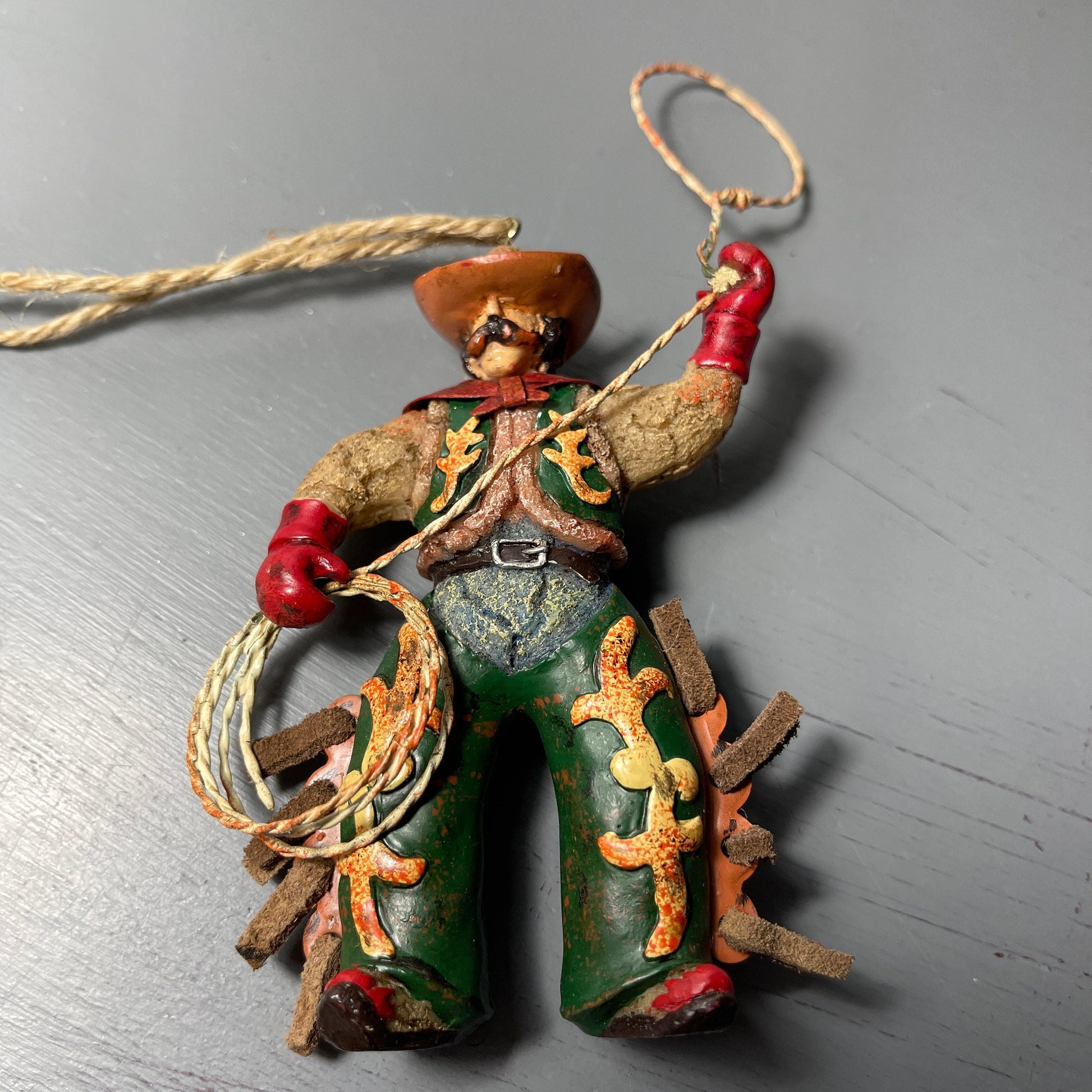 Lasso Cowboy and Saddle with Stirrups Set Of 2 Western Christmas Ornaments