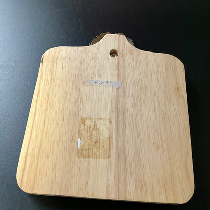 Cute cutting board with beautiful brass wreath medallion embellished with a b cross stitch finishing button wall hanging